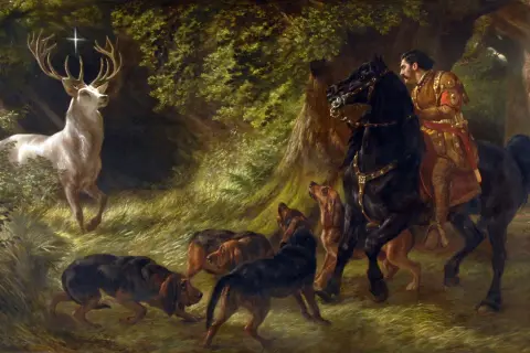 Ein weißer Hirsch mit einem Kreuz zwischen den Geweihen, ein Reiter auf einem schwarzen Pferd und Jagdhunde im Wald. Dies ist die Legende des Heiligen Hubertus, der an seinem Gedenktag, dem Hubertustag, gefeiert wird.