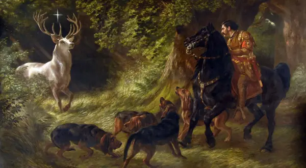 Ein weißer Hirsch mit einem Kreuz zwischen den Geweihen, ein Reiter auf einem schwarzen Pferd und Jagdhunde im Wald. Dies ist die Legende des Heiligen Hubertus, der an seinem Gedenktag, dem Hubertustag, gefeiert wird.